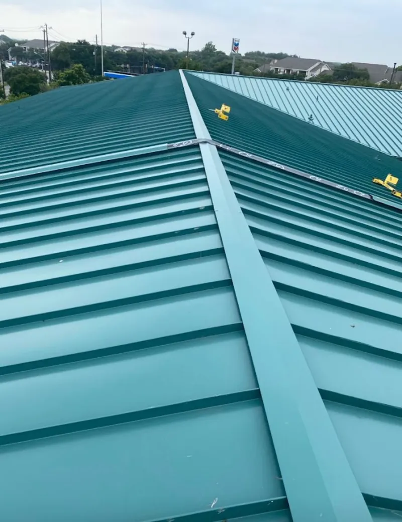 Green commercial metal roof ridge and valley for Metal Roof Repair in Estherville