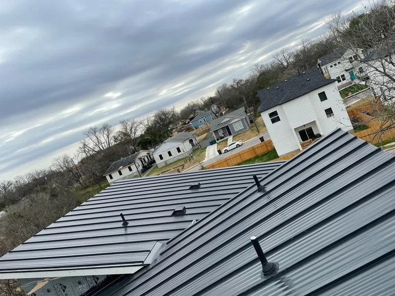 Standing seam metal roof panels with vents for Skylight Repair in Estherville